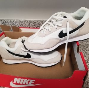 Brand new, never worn, Nike outburst size 8. 5